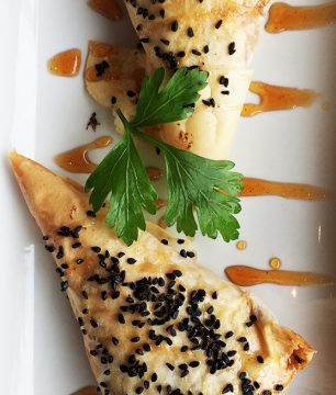 Phyllo triangles with sweet potatoes, feta and onions.