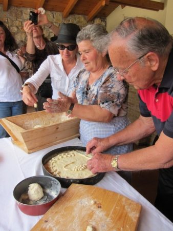 Making festive, decorative bread in Crete.