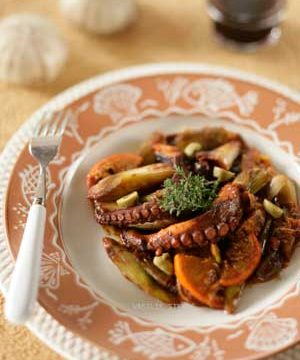 Braised octopus with caramelized leeks, oranges, mixed olives