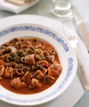 Squid cooked in tangy olive-tomato sauce.