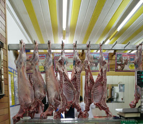Easter lambs sold whole at butcher shops around Greece.