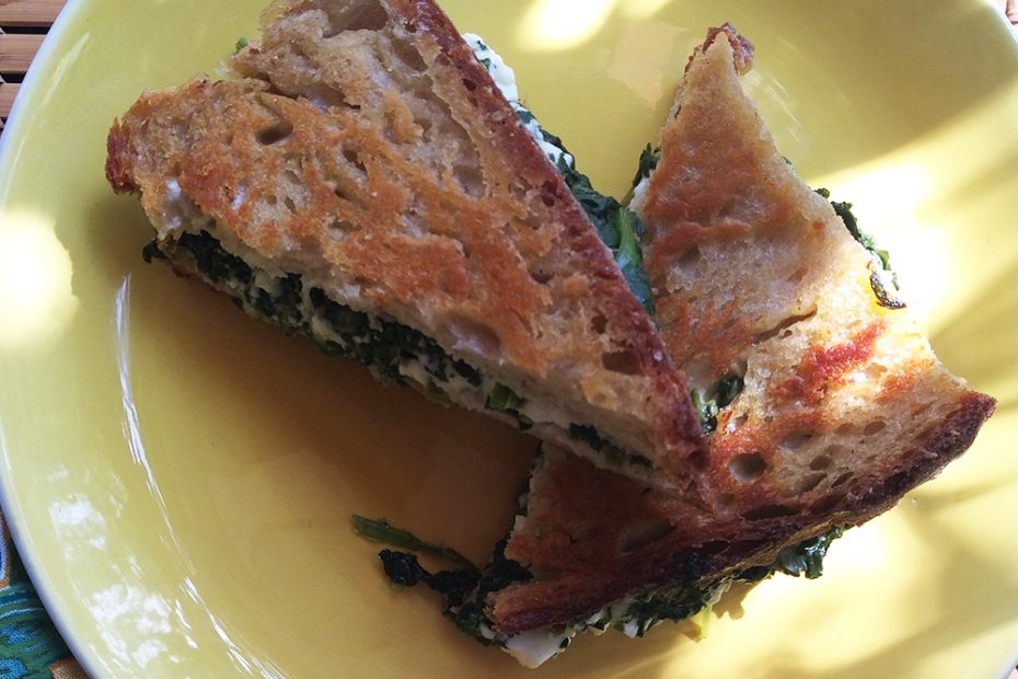 Grilled cheese with Greek spinach pie filling.