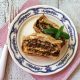 Phyllo cheese pie in a loaf pan with sundried tomatoes