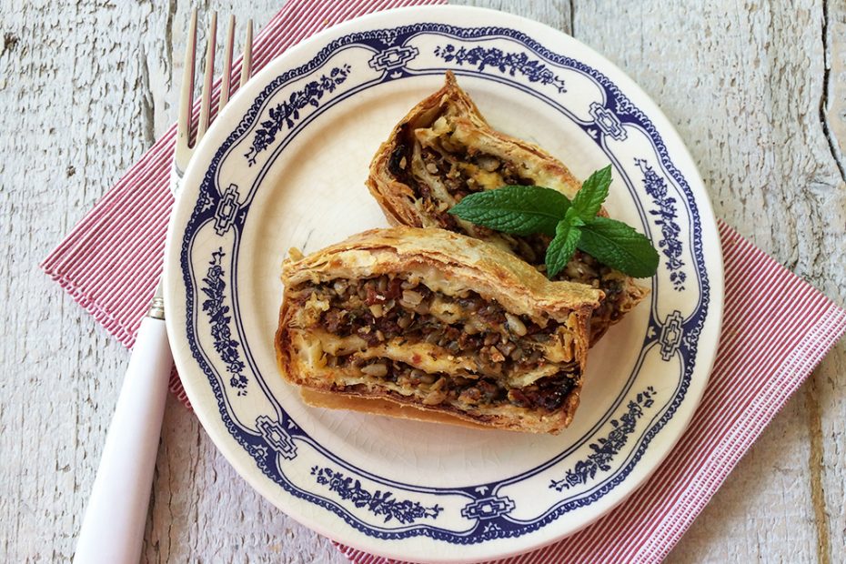 Phyllo cheese pie in a loaf pan with sundried tomatoes