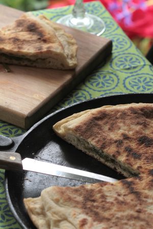 Ikarian pancake with collards and pork