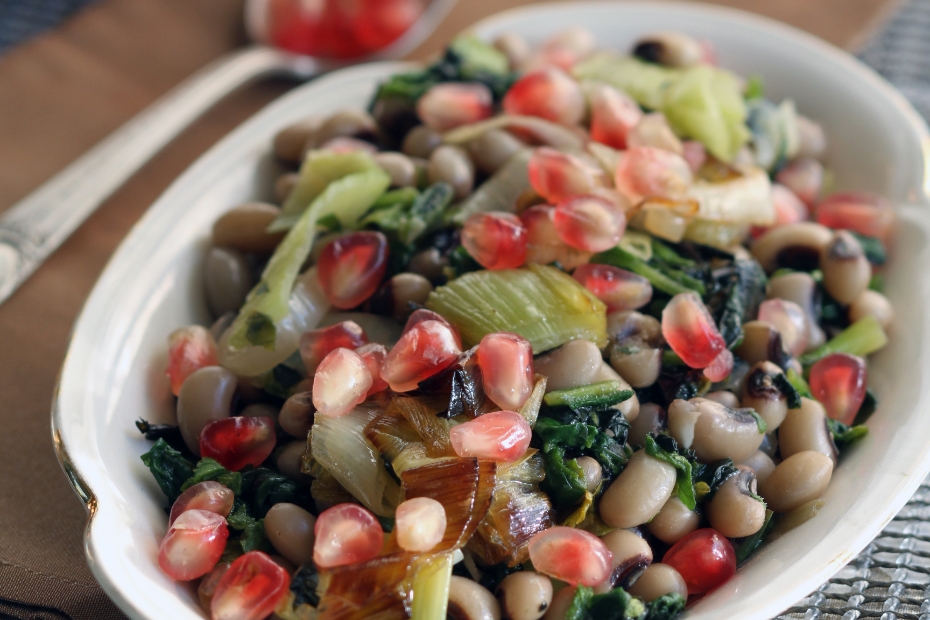 Pomegranate arils grace this black eyed pea spinach salad