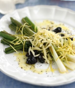 Grilled Scallions with Aged Kasseri from Sohou. Photo: Vassilis Stenos