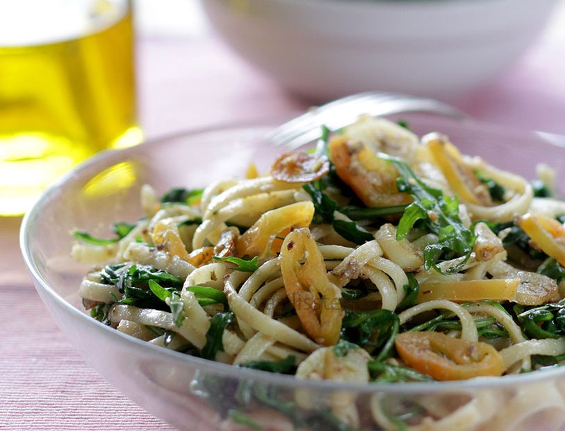 Wilted arugula, chile peppers, garlic and linguine