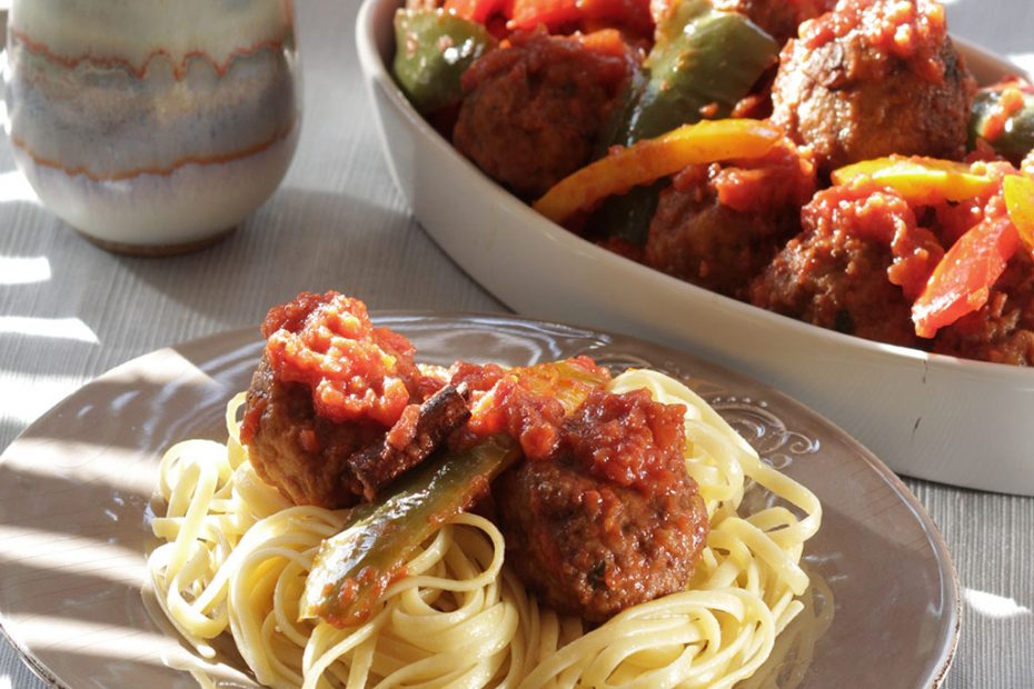 Greek meatballs cooked in tomato-pepper stew