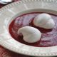 Meringues in a strawberry soup
