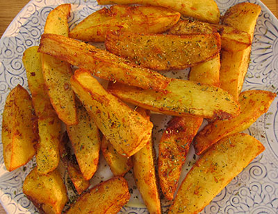 Greek fried potatoes, in olive oil with wild oregano.