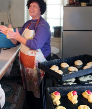 Our neighbor, Vasso, makes tsoureki, the Greek Easter bread, at the village bakery.