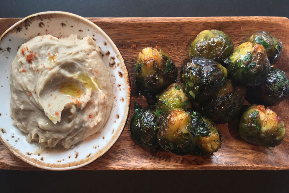 Honey-charred brussel sprouts and skordalia made with pureed chestnuts.