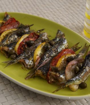 Baked Sardines with Ouzo, Tomatoes, Capers, and Lemon