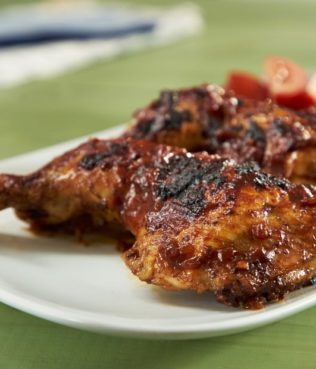 Grilled Chicken Legs with Tomato-Olive Barbecue Sauce