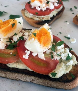 Lemon Hummus Toast With Feta & Eggs