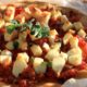 Santorini Pizza with Fava Crust, Tomatoes, Halloumi & Herbs