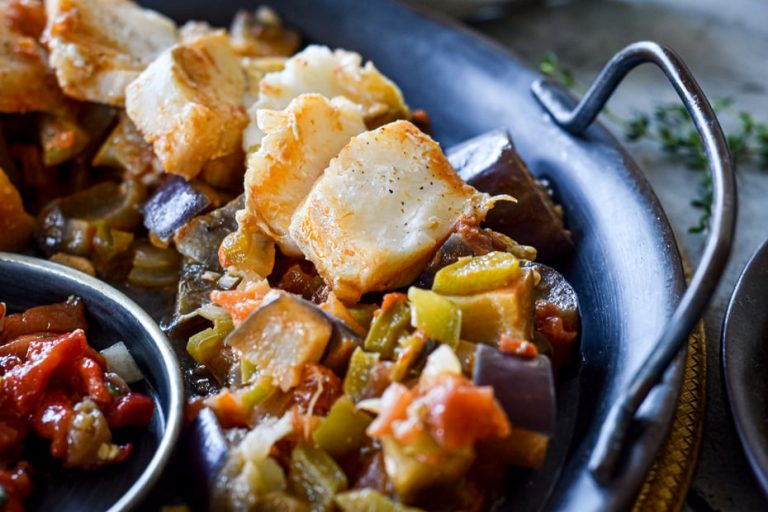 Fresh Cod Fillets Stewed with Eggplants, Peppers and Wine