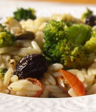 Warm Orzo Pilaf with Broccoli, Olives, Ouzo, Halloumi & Pistachios