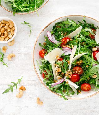 Superfood Arugula Salad with Pomegranate, Pine Nuts and Tomatoes