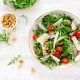 Greek salad with arugula, nuts, and extra virgin Greek olive oil