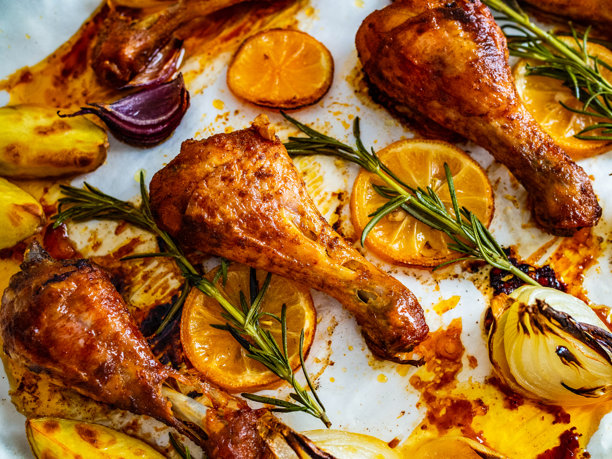 Low-Carb Sheet-Pan Chicken Drumsticks Roasted with Oranges, Onions and Rosemary