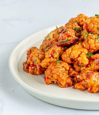 CRUNCHY, SPICY GREEK-STYLE BUFFALO CAULIFLOWER