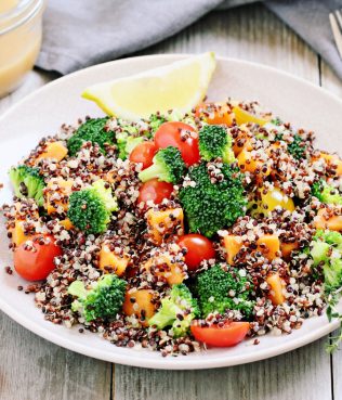 QUINOA BOWL WITH BROCCOLI, TOMATOES, SWEET POTATOES & LEMON-YOGURT DRESSING