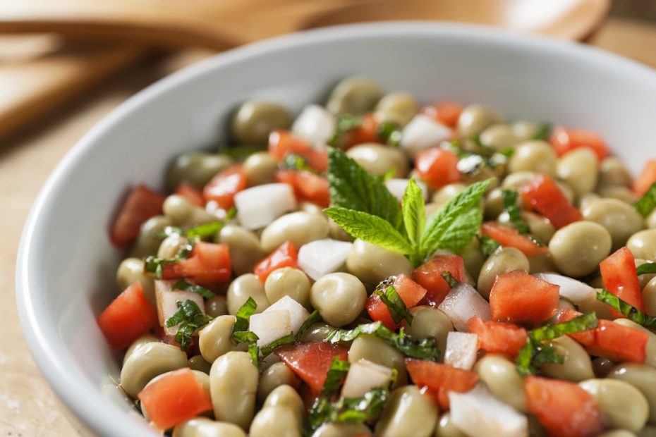 Broad green bean salad with tomatoes, onions and mint