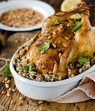 WHOLE ROASTED CHICKEN STUFFED WITH WILD RICE & PINE NUTS