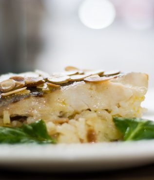 ALMOND CRUSTED HAKE OVER ALMOND RISOTTO