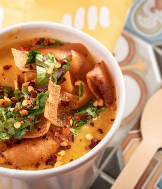 RED LENTIL SOUP WITH CHILI, CILANTRO AND TOASTED PITA BREAD