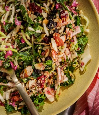 KALE, CABBAGE SLAW WITH ALMONDS, DRIED FRUITS AND SEEDS