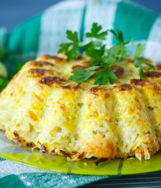 BAKED RICE CASSEROLE WITH ZUCCHINI AND HERBS