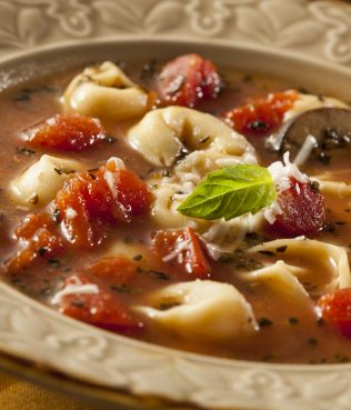 RUSTIC HOMEMADE TORTELLINI SOUP WITH TOMATO, BASIL, AND SPINACH