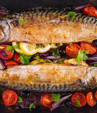 WHOLE MACKEREL BAKED OVER VEGETABLES