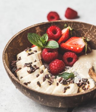 CHIA SEED PUDDING WITH FRESH BERRIES AND DARK CHOCOLATE NIBS