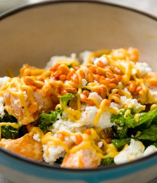 Green Salad With Roasted Pumpkin, Feta, Pine Nuts, And An Orange Vinaigrette