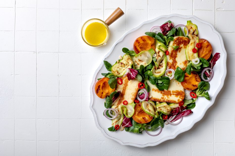 Zucchini salad with apricots, halloumi and mustard dressing.