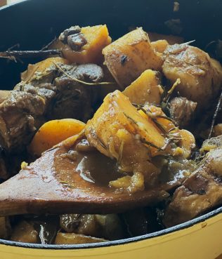 Lemony Braised Goat With Blackened Garlic and White Wine