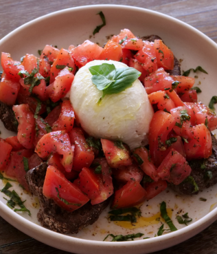 Carob Rusk Tomato Salad with Burrata
