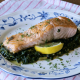 Ouzo Salmon Baked Over Greens