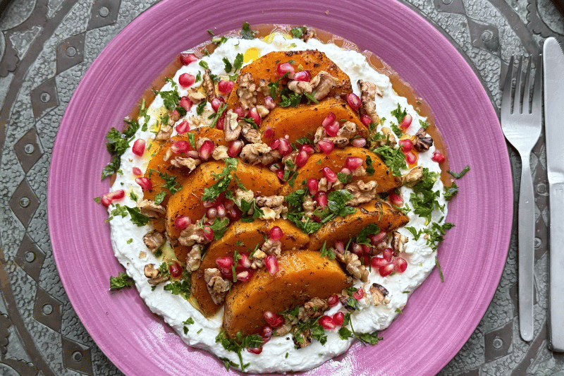 Roasted butternut squash with whipped feta, walnuts and pomegranate