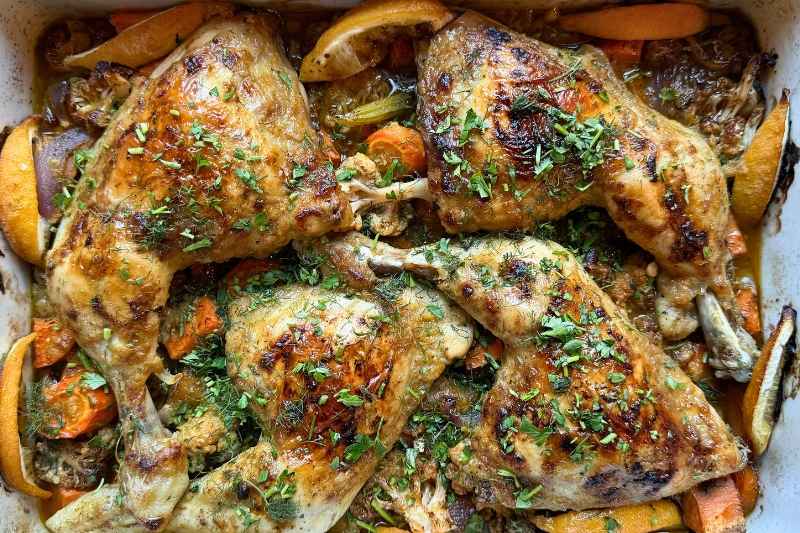 One-pan Greek lemon chicken with roasted sweet potatoes, cauliflower, leeks and carrots